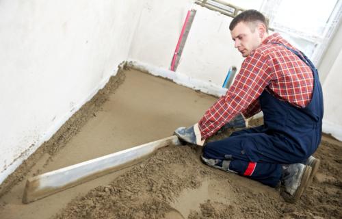 13425902 - plasterer concrete worker at floor work